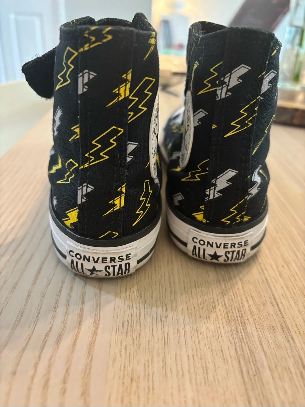Converse Kids Black High Top Sneakers with Yellow Lightning Bolt Print